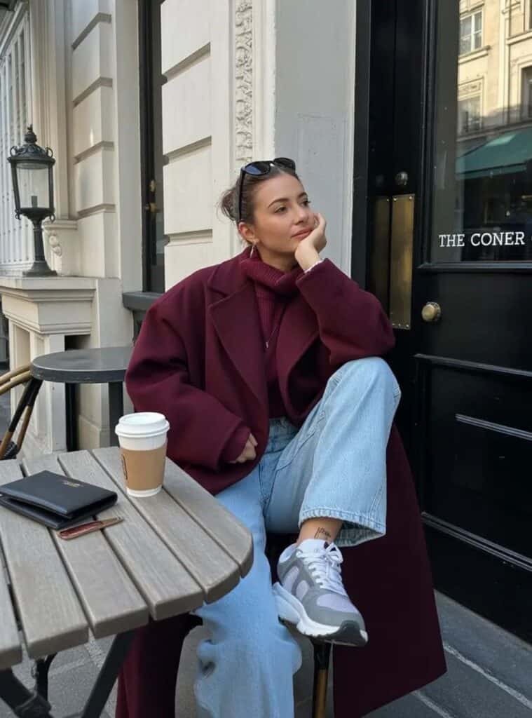 7 Burgundy Oversized Coat Turtleneck Sweater Light Wash Jeans Sneakers green outfit for christmas burgundy coat turtleneck jeans