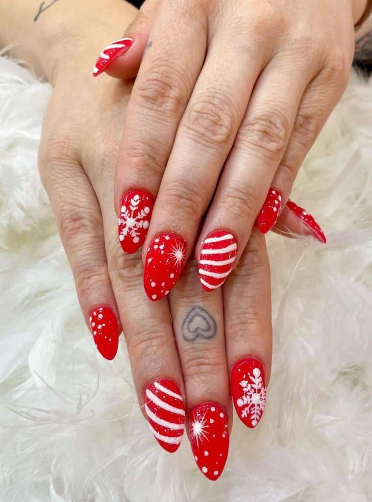 10 Snowflake Red Almond Stripes festive white and red christmas nails with striped snowflake art