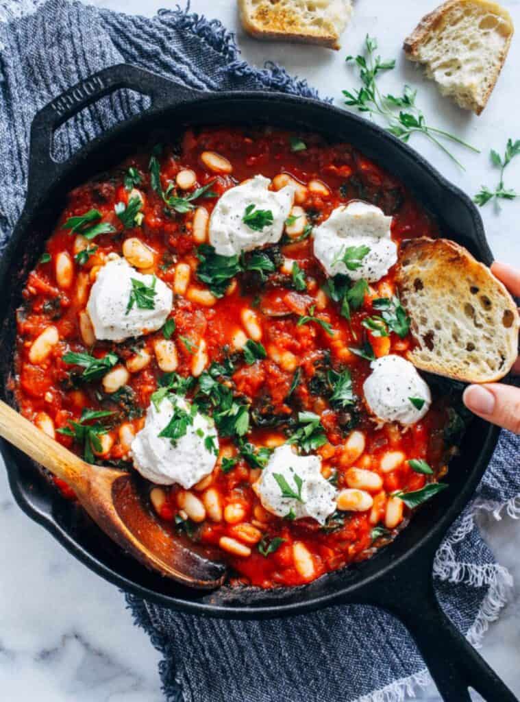18 Hearty One Pot Vegan White Bean Shakshuka skillet of vegan shakshuka, healthy holiday appetizer