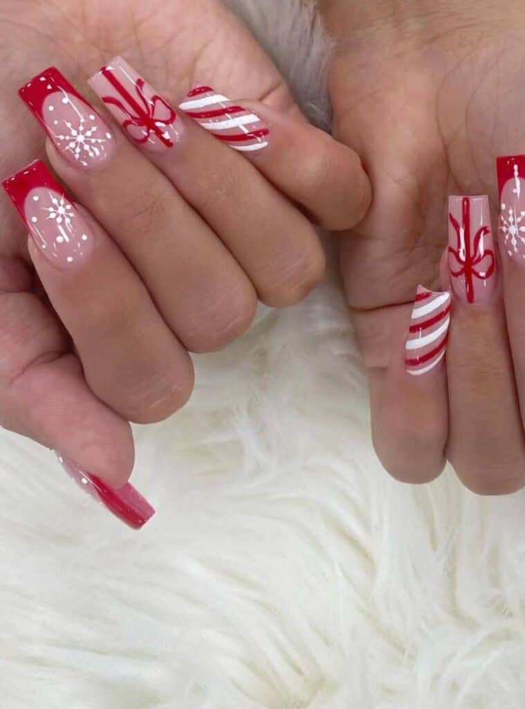 2 Snow Coffin French elegant white and red christmas nails with gift-inspired accents