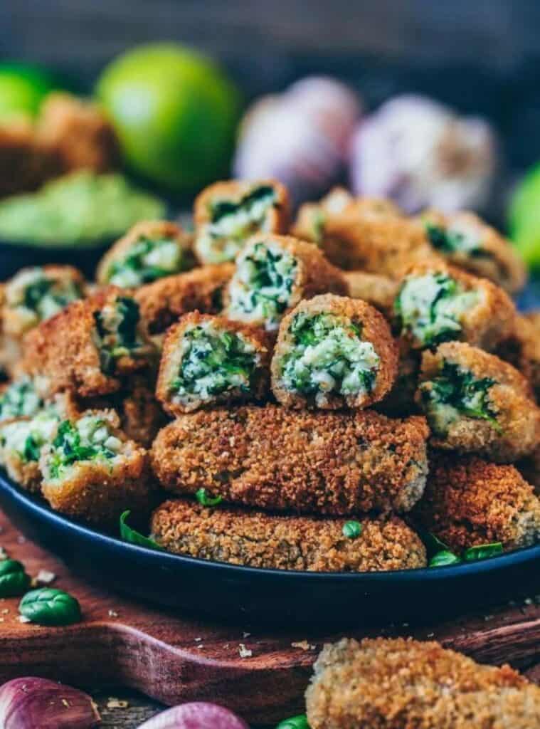 20 Crispy Vegan Spinach Croquettes spinach croquettes on platter, healthy christmas appetizer