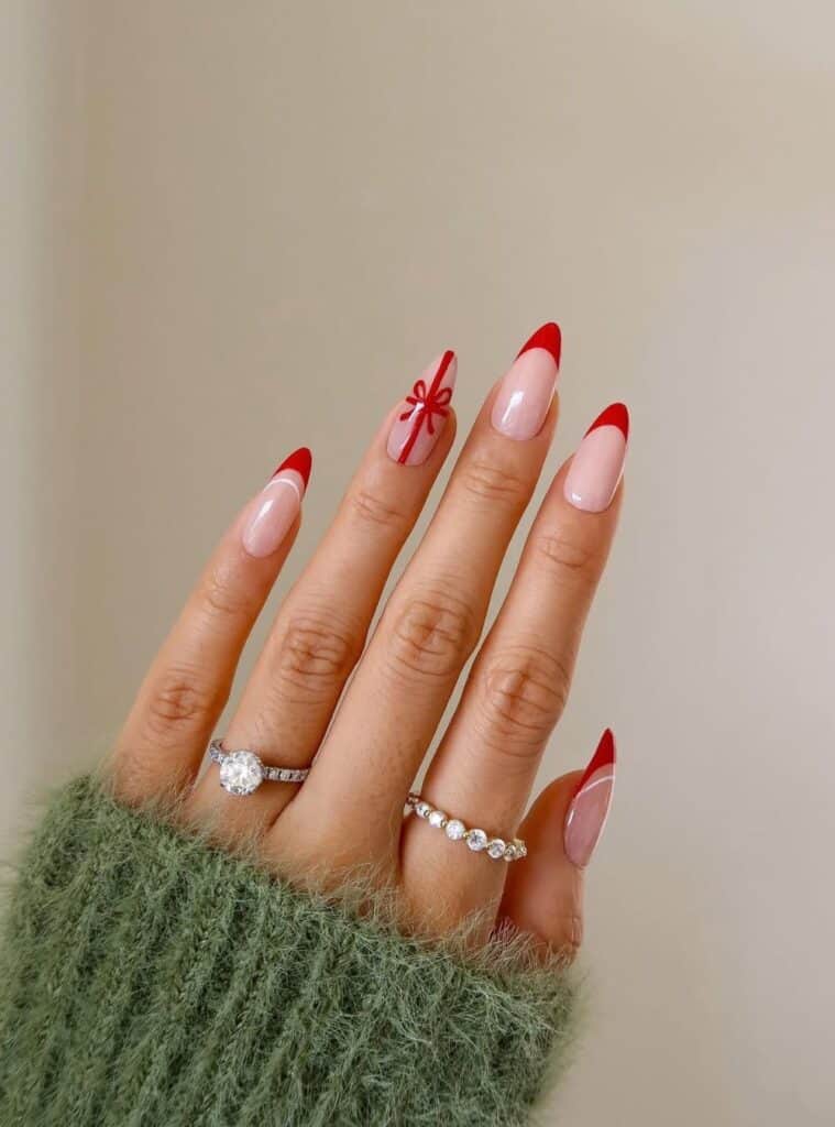 7 Red Present Design Stiletto French gift-inspired red nails with white ribbon accents