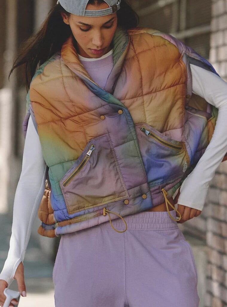 10 Multi Color Ombre Puffer Vest Lilac Knit Sweater Lavender Joggers multi color ombre puffer vest styled over a lilac knit sweater and lavender joggers a colorful and cute winter hiking outfit for women