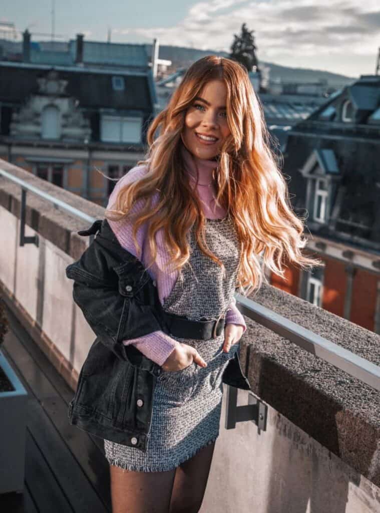 13 Lilac Knit Sweater Tweed Pinafore Dress Dark Denim Jacket 1 lilac knit sweater styled with a tweed pinafore dress and denim jacket for winter outfits for europe