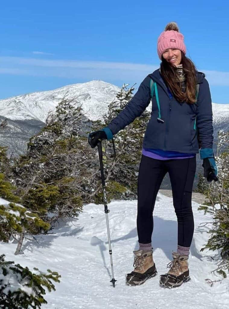 15 Navy Performance Softshell Black Athletic Tights Pink Pom Pom Beanie navy performance softshell paired with black athletic tights and a pink pom pom beanie a sporty winter hiking outfit for women