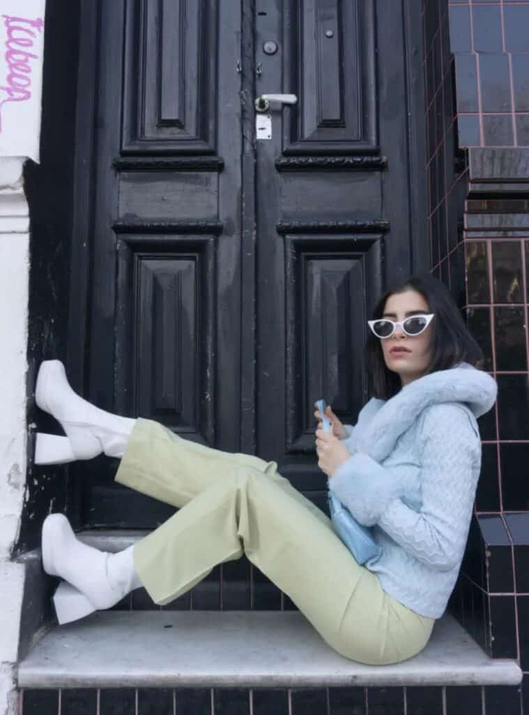 16 Powder Blue Faux Fur Sage Green Trousers White Platform Boots colorful winter outfit ideas featuring a powder blue faux fur jacket styled with sage green trousers and white platform boots