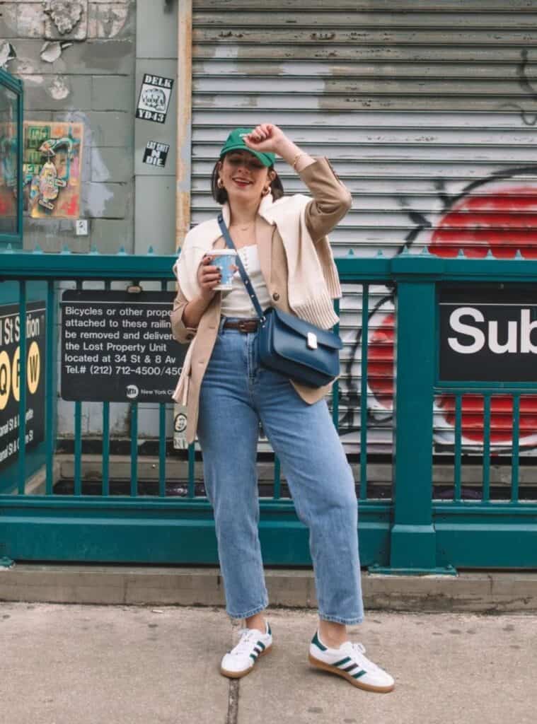 19 Beige Wool Blazer Light Wash Denim Cream Shoulder Sweater casual winter layering in spain styled with a beige wool blazer, light wash denim, and a cream shoulder sweater