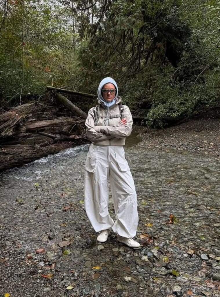 19 Sand Cropped Windbreaker White Wide Leg Cargoes Hiking Sneakers sand cropped windbreaker styled with white wide leg cargo pants and hiking sneakers a fresh winter hiking outfit with neutral tones