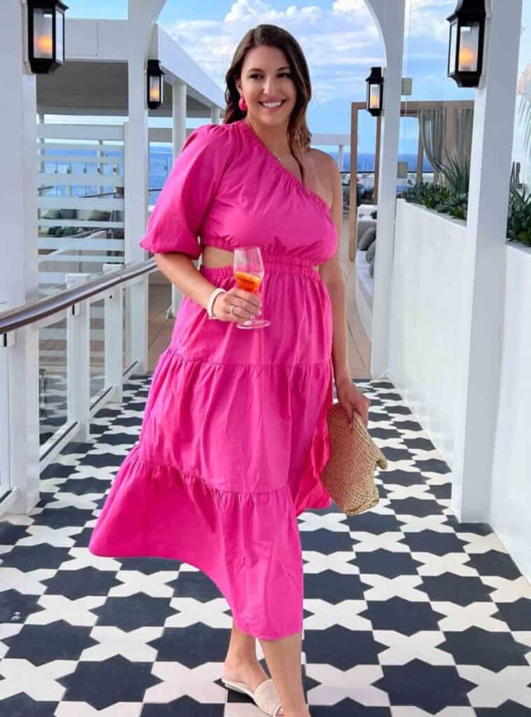 21 Hot Pink One Shoulder Tiered Midi Dress Cream Slide Sandals Woven Straw Clutch hot pink one shoulder tiered midi dress straw clutch cruise look