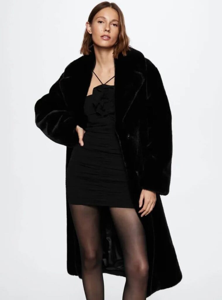 23 Black Ruched Mini Dress Black Faux Fur Maxi Coat Sheer Black Tights black ruched mini dress faux fur coat winter cruise night outfit