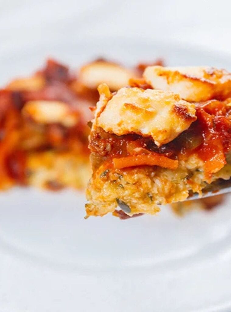 24 Healthy Vegetarian Pizza Casserole Loaded with Veggies veggie pizza casserole baked and sliced