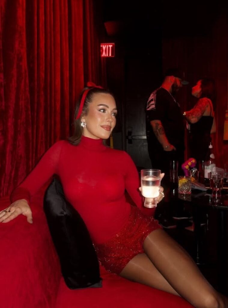 24 Red Turtleneck Top Red Sequin Mini Skirt Sheer Black Tights Pointed Toe Heels red sequin mini skirt styled as statement winter nightlife outfits in vegas