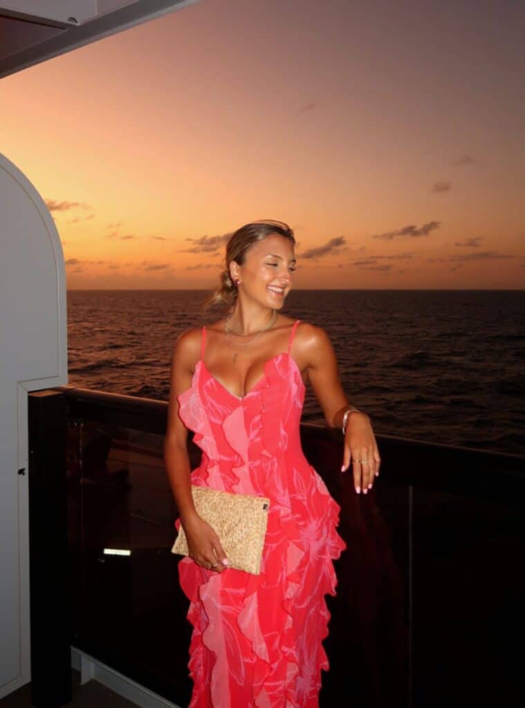 3 Fuchsia Ruffled Dress Straw Clutch Bag Pink Strappy Sandals fuchsia ruffled dress pink sandals straw clutch cruise evening look