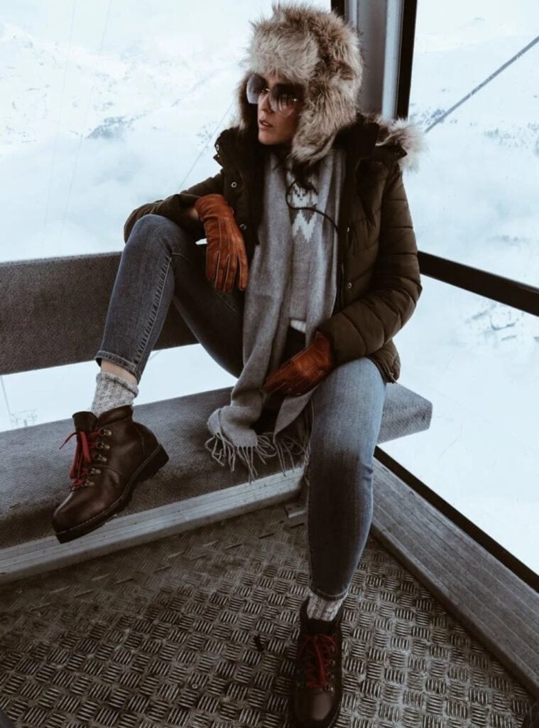 7 Dark Khaki Puffer Jacket Grey Turtleneck Sweater Brown Lug Sole Boots dark khaki puffer jacket layered over a grey turtleneck for practical switzerland winter outfits