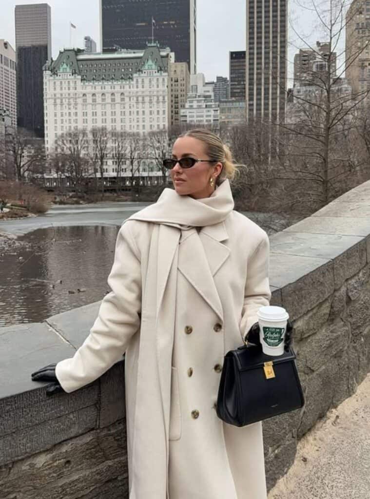 8 Cream Double Breasted Coat Off White Turtleneck Black Leather Top Handle Bag cream double breasted coat styled with an off white turtleneck for chic winter outfits for europe
